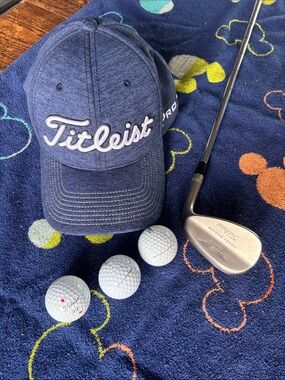 Titleist Silver Vokey Design Wedge 54 degree Titleist hat and 3 Pro v1 balls